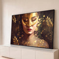 Quadro Decorativo Grande Mulher com Máscara para Sala | quadros decorativos para sala | mulher de olhos fechados com máscara dourada e folhas douradas ao fundo escuro | Porao dos Quadros