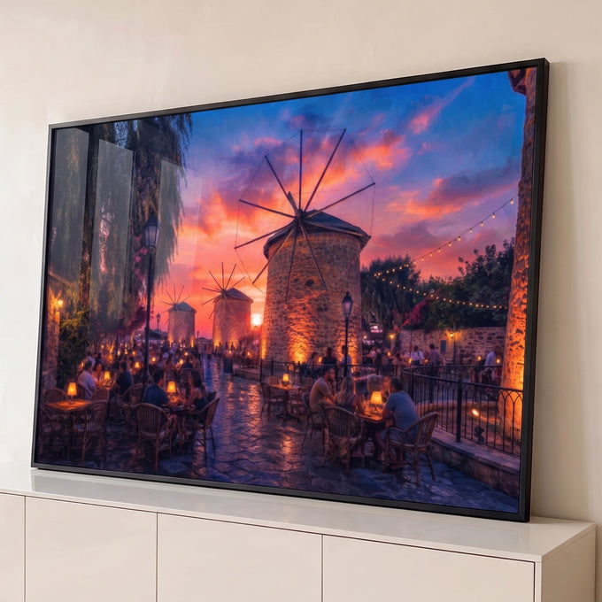 Quadro Decorativo Grande Pôr do Sol Moinhos para Sala | quadros decorativos para sala | pôr do sol colorido sobre moinhos de pedra com café ao ar livre numa rua de paralelepípedos | Porao dos Quadros