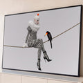 Quadro Decorativo Grande Arlequim Xadrez para Sala Preto | quadros decorativos para sala | arlequim em xadrez preto e branco sentada numa corda ao lado de um pássaro preto | Porao dos Quadros