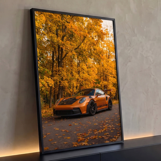 Quadro Decorativo Grande Carro Esportivo para Sala Laranja | quadros decorativos para sala | carro esportivo laranja estacionado em estrada cercada por árvores de outono douradas | Porao dos Quadros