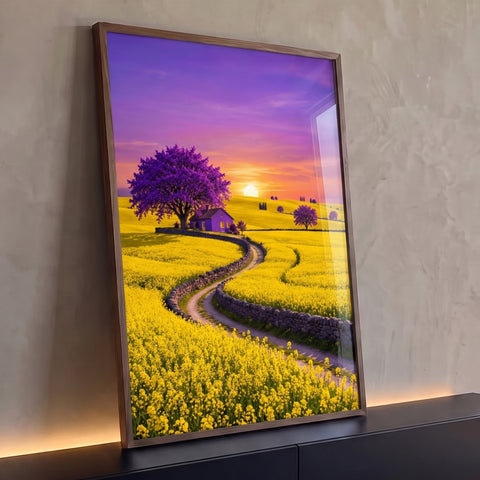 Caminho entre muros de pedra em campo amarelo com árvore roxa e casa ao pôr do sol, quadro decorativo