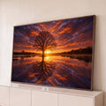 Árvore solitária em silhueta refletida no lago ao pôr do sol, céu laranja e roxo, quadro decorativo