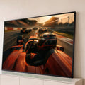 Piloto de Fórmula 1 em carro laranja disputando corrida na pista ao pôr do sol, quadro decorativo
