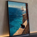 Quadro Decorativo Grande Gato Preto Azul para Sala | quadros decorativos para sala | gato preto deitado em varanda de pedra observando veleiro no mar azul | Porao dos Quadros