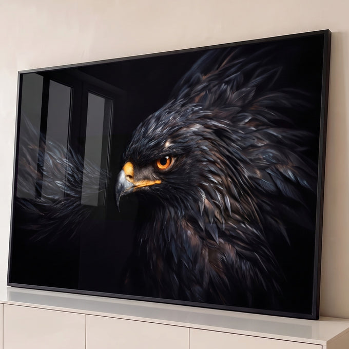 Quadro Decorativo Grande Águia de Olhar para Sala Preto | quadros decorativos para sala | retrato de águia com penas escuras despenteadas e olho laranja vibrante sobre fundo preto | Porao dos Quadros