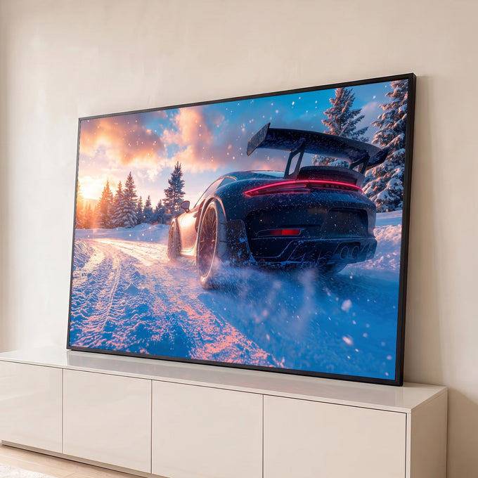 Quadro Decorativo Grande Carro Esportivo Neve para Sala | quadros decorativos para sala | carro esportivo preto na neve com aerofólio e céu de pôr do sol ao fundo | Porao dos Quadros