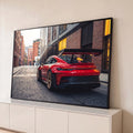 Quadro Decorativo Grande Carro Aerofólio para Sala Vermelho | quadros decorativos para sala | carro esportivo vermelho com aerofólio preto em rua de tijolos | Porao dos Quadros