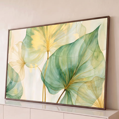 Folhas translúcidas em aquarela verde e amarela com nervuras douradas sobre fundo creme, quadro decorativo