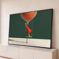 Quadro Decorativo Grande Mulher de Vermelho para Sala | quadros decorativos para sala | mulher de vestido laranja em balanço com balão trançado bege suspenso sobre fundo verde | Porao dos Quadros