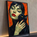 Quadro Decorativo Mulher com Gato Preto em Fundo Laranja | quadros decorativos para sala | mulher de olhos fechados segurando gato preto de olhos amarelos em fundo laranja | Porao dos Quadros