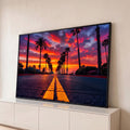 Quadro Decorativo Grande Avenida de Palmeiras para Sala | quadros decorativos para sala | avenida com palmeiras e pôr do sol laranja e roxo intenso ao fundo | Porao dos Quadros