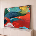 Quadro Decorativo Abstrato com Pincelada Azul Marinho | quadros decorativos para sala | pincelada abstrata azul-marinho ondulada sobre fundo vermelho, verde e amarelo | Porao dos Quadros