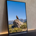 Quadro Decorativo Águia Dourada em Rocha com Montanhas | quadros decorativos para sala | águia dourada pousada em rocha com montanhas e céu azul ao fundo | Porao dos Quadros