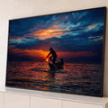 Quadro Decorativo Grande Pescador ao Pôr do Sol para Sala | quadros decorativos para sala | pescador em silhueta puxando rede ao pôr do sol com céu laranja e azul | Porao dos Quadros