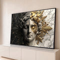 Busto de Apolo dividido em mármore preto e branco com raios e ornamentos dourados, quadro decorativo