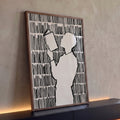 Quadro Decorativo Grande Silhueta Lendo para Sala Preto | quadros decorativos para sala | silhueta bege lendo livro cercada por linhas verticais pretas em estilo gráfico | Porao dos Quadros
