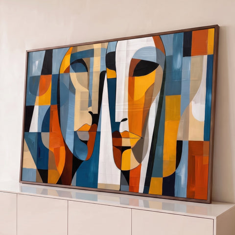 Dois rostos cubistas lado a lado em blocos azul, laranja, bege e preto, pintura abstrata, quadro decorativo
