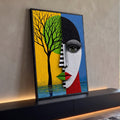 Quadro Decorativo Grande Rosto Dividido para Sala Amarelo | quadros decorativos para sala | rosto feminino dividido ao meio com árvore preta e paisagem amarela e azul | Porao dos Quadros