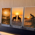 Quadro Decorativo Kit 3 Telas Surfistas e Cães para Sala | quadros decorativos para sala | surfistas, cães pastor alemão e surfe ao pôr do sol em tons dourados | Porao dos Quadros
