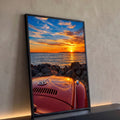 Capô de Fusca antigo laranja diante do mar, pedras e pôr do sol com ponte ao fundo, quadro decorativo