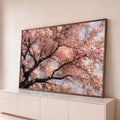 Quadro Decorativo Grande Cerejeira em Flor para Sala Rosa | quadros decorativos para sala | galhos de cerejeira em flor com pétalas rosa contra céu azul | Porao dos Quadros