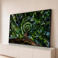 Quadro Decorativo Grande Copa de Árvore Folhas para Sala | quadros decorativos para sala | vista de baixo para cima de árvore com galhos em espiral e folhagem verde densa | Porao dos Quadros