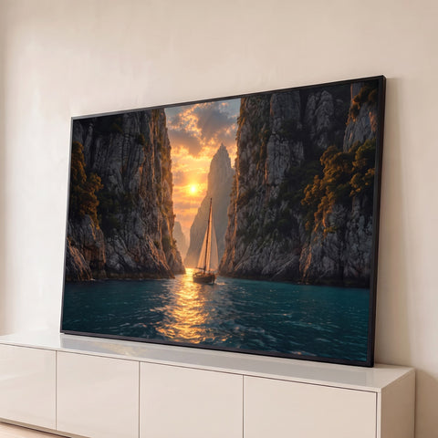 Veleiro navegando entre penhascos rochosos ao pôr do sol sobre mar turquesa, quadro decorativo