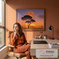 Quadro Decorativo Grande Lua Gigante para Sala Laranja | quadros decorativos | lua laranja gigante atrás de acácia com antílopes caminhando na savana ao entardecer | em ambiente 2 | Porao dos Quadros