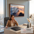 Quadro Decorativo Grande Picos de Montanha para Sala Laranja | quadros decorativos | picos de montanha escuros emergindo de nuvens com céu laranja ao pôr do sol | em ambiente 2 | Porao dos Quadros
