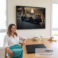 Porsche 911 cinza em showroom iluminado, lanterna vermelha e rodas pretas, quadro decorativo