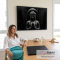 Quadro Decorativo Grande Buda em Oração para Sala Preto | quadros decorativos | estátua de Buda em preto e branco com eclipse brilhante atrás da cabeça | em ambiente 2 | Porao dos Quadros