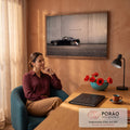 Quadro Decorativo Grande Carro Trans Am para Sala Preto | quadros decorativos | menino agachado com skate observando roda de carro trans am preto | em ambiente 2 | Porao dos Quadros