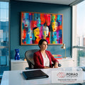 Quadro Decorativo Grande Rostos Femininos para Sala Azul | quadros decorativos | múltiplos rostos femininos estilizados em linhas pretas sobre fundo colorido em blocos geométricos | em ambiente 2 | Porao dos Quadros