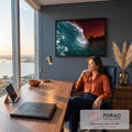 Onda do mar formando tubo azul-turquesa com céu laranja e prédios na orla ao entardecer, quadro decorativo