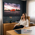 Porsche 911 laranja com aerofólio em asfalto sob céu roxo e rosa ao pôr do sol, quadro decorativo