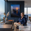 Arco de pedra sobre praia deserta com lua cheia refletindo no mar azul ao anoitecer, quadro decorativo