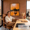 Silhueta de cavaleiro montado a cavalo cruzando rio sob sol laranja, com reflexo na água, quadro decorativo