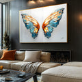 Asas de borboleta em vidro azul e laranja iluminado sobre fundo branco, quadro decorativo