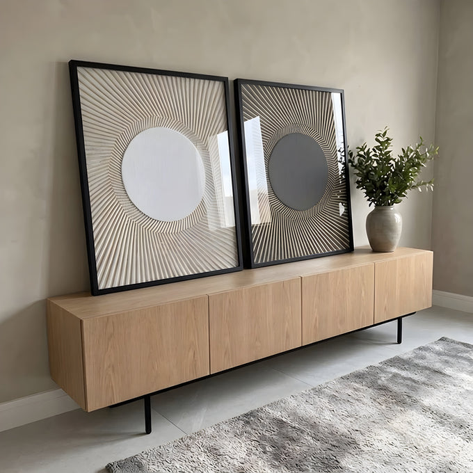 Duas telas com círculo central e linhas radiais em relevo, uma branca e outra cinza escura, quadro decorativo