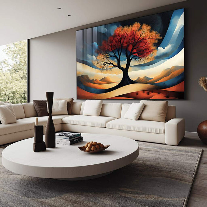 Quadro Decorativo Árvore do Entardecer | quadros decorativos para sala | Árvore de copa vermelha e alaranjada em paisagem desértica com tons azuis e ocre, composição surrealista e dinâmica. | Porao dos Quadros