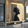 Quadro Decorativo Silhueta Elegante: Feminino | quadros decorativos para sala | Silhueta de mulher em perfil com cabeça envolvida em tecido, preto e branco com tom creme. | Porao dos Quadros