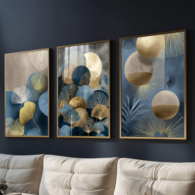Quadro Decorativo Tríptico Elegante em Azul | quadros decorativos para sala | Três telas com folhas douradas, esferas bege e tons azuis em composição sofisticada. | Porao dos Quadros