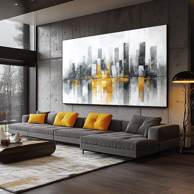 Quadro Decorativo Urbano Cinza e Amarelo | quadros decorativos para sala | Skyline urbano em tons de cinza e dourado com reflexo em água em composição horizontal | Porao dos Quadros
