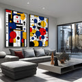 Duas telas abstratas estilo Bauhaus com círculos azuis, vermelhos e amarelos e grade preta, quadro decorativo
