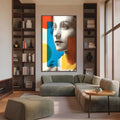 Rosto de mulher em retícula preto e branco com formas geométricas azul, amarela e vermelha, quadro decorativo
