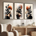 Quadro Decorativo Geométrico Moderno | quadros decorativos para sala | Plantas com folhas pretas e círculos terracota em composição geométrica moderna em três painéis. | Porao dos Quadros