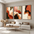 Quadro Decorativo Tríptico Orgânico | quadros decorativos para sala | Triptíco com formas abstratas ondulantes em laranja, preto e branco, criando movimento visual dinâmico | Porao dos Quadros