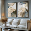Dois quadros com anéis de tronco dourados, manchas azul acinzentadas e fundo branco, quadro decorativo