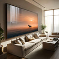 Quadro Decorativo Cavalo em Liberdade Plena | quadros decorativos para sala | Cavalo em silhueta ao pôr do sol dourado em campo com névoa matinal e composição poética | Porao dos Quadros