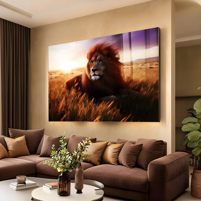 Leão de juba avermelhada deitado em trigal dourado na savana ao pôr do sol, quadro decorativo